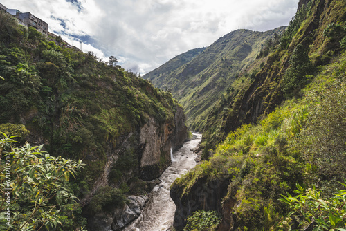 Photography Magnificent view of the river and mountains in a deep canyon in the city of Banos, Ecuador