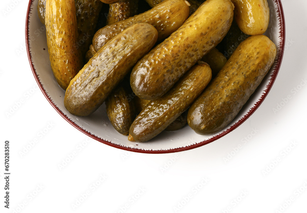 Bowl with delicious fermented cucumbers on white background, closeup Bowl with delicious fermented cucumbers on white background, closeup