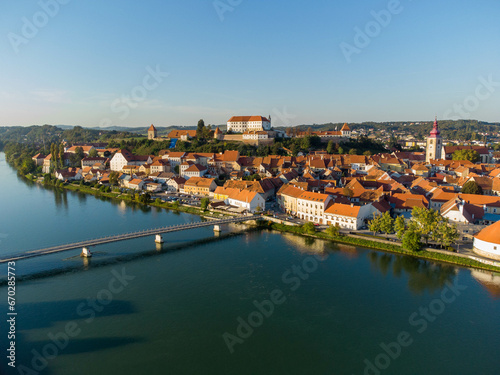 Ptuj in Slovenia, panoramic view with river Drava in foreground. photo