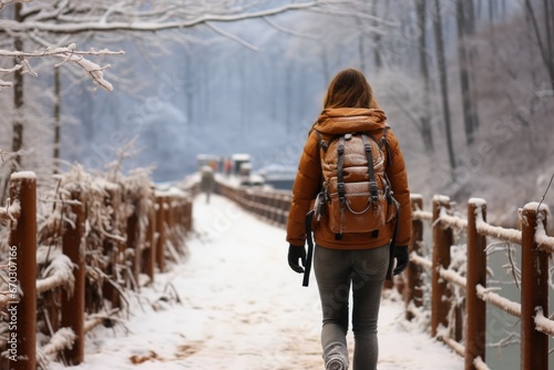 woman walking in winter forest © Aurora Blaze