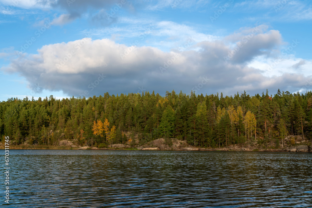 Lake Ladoga near the village Lumivaara on a sunny autumn day, Ladoga skerries, Lakhdenpokhya, Republic of Karelia, Russia Lake Ladoga near the village Lumivaara on a sunny autumn day, Ladoga skerries, Lakhdenpokhya, Republic of Karelia, Russia