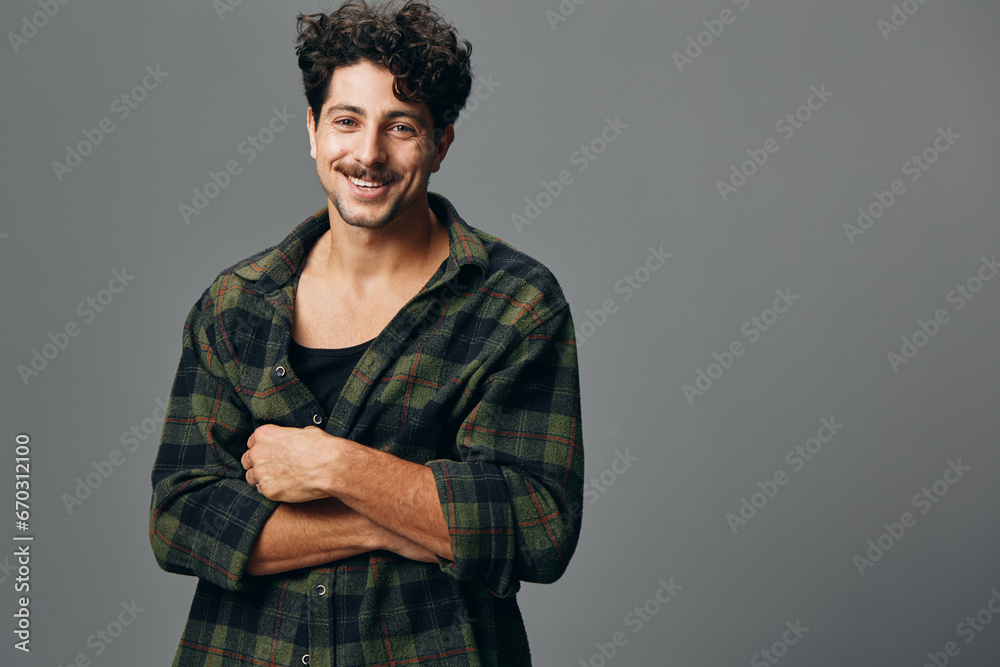 Obraz premium Smile man copyspace fashion gesture trendy hispanic shirt portrait face checkered handsome hipster young