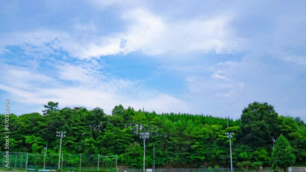 A timelapse of the cloud at the school ground at the country side wide shot zoom A timelapse of the cloud at the school ground at the country side wide shot zoom