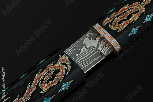 hand-forged Japanese samurai knife tanto with inlays in the form of hieroglyphs in black dener on a black background