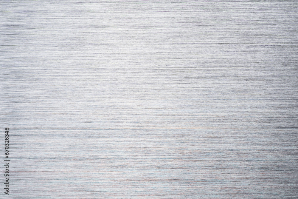 Fototapeta premium Brushed metal stainless steel texture background with reflection light