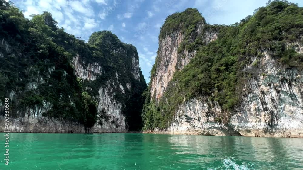 Sailing in longboat through Khao Sok - Thailand - Handheld 4k Sailing in longboat through Khao Sok - Thailand - Handheld 4k
