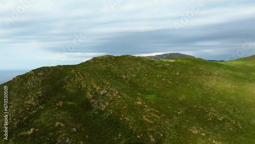 Steep Mountains Revealed Seascape In Sierra de la Capelada Near Cabo Ortegal, La Coruna In Galicia, Spain. Aerial Ascending photo