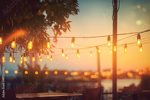 restaurant beach decor lights string yellow sunset light bokeh blurred summer night party event bar background hot festival blur bright holiday photo