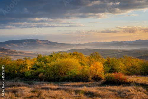 Golden hour landscape over the hills during the autumn