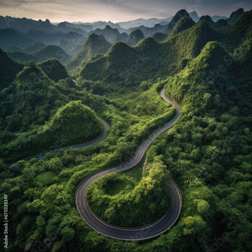 Serpentine Journey Aerial View of Lush Green Road