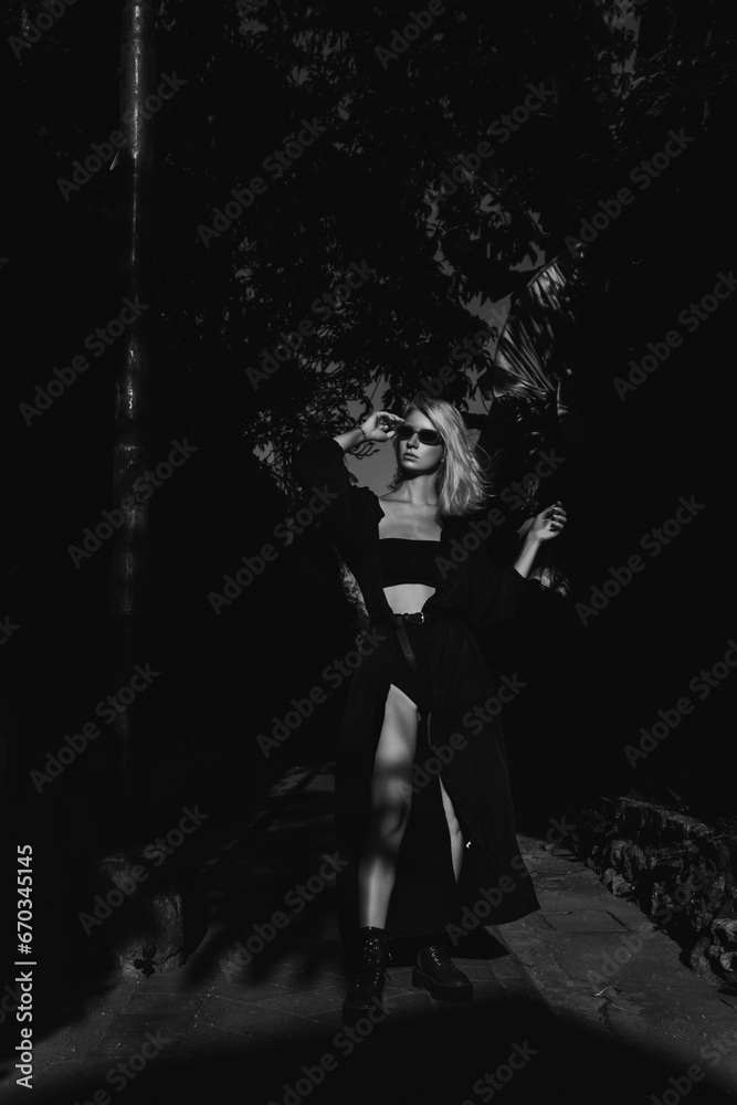 Girl posing on the street, black and white photography