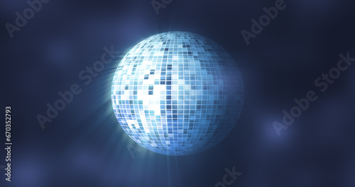 Abstract blue mirrored spinning round disco ball for discos and dances in nightclubs 80s, 90s luminous background
