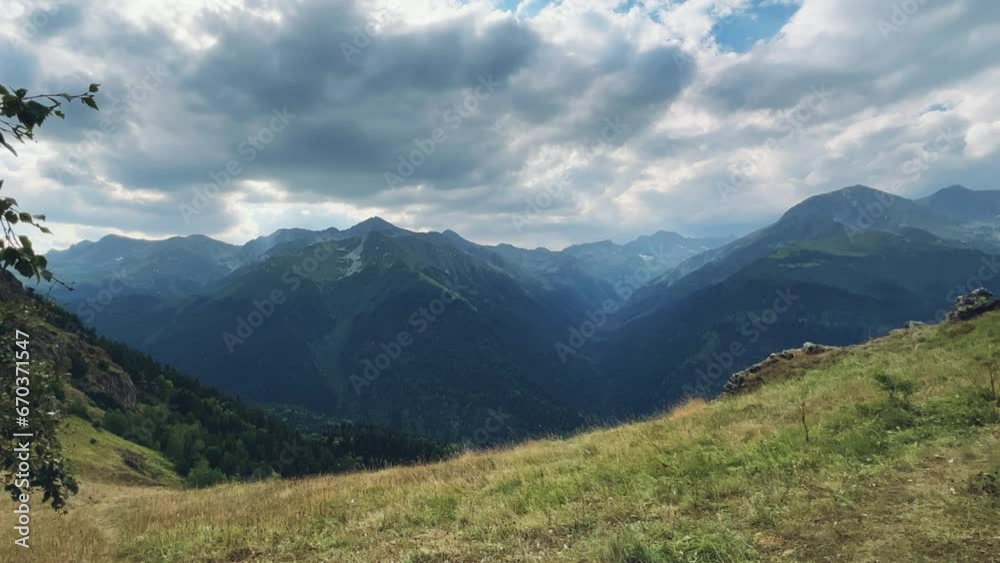 View of the mountain range near Mount Zakan. The top of the mountain node of the western part of the main ridge of the Greater Caucasus. Zakan Peak is the beginning of the Magisho mountain range. 4К View of the mountain range near Mount Zakan. The top of the mountain node of the western part of the main ridge of the Greater Caucasus. Zakan Peak is the beginning of the Magisho mountain range. 4К