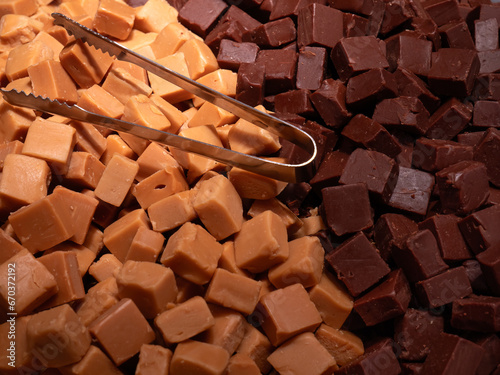 Closeup of mixture of dark and light chocolate fudge on a stall at a food market