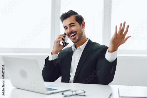Man talk smile computer office phone businessman
