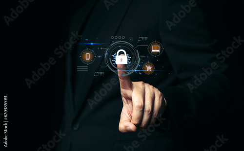 Cyber security concept, Businessman pressing lock icon with binary code, cyber security concept.