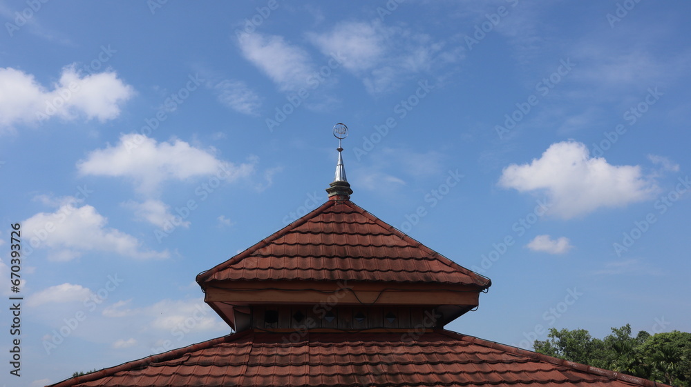 Islamic mosque and blue sky, perspective of mosque dome and lower angle view.