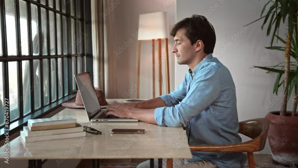Man Typing on Keyboard of Laptop Computer in Home Office Close Up. Entrepreneur Working Online with Internet Connection on Mobile Device. Learning Business Success in Web Data and Document Information Man Typing on Keyboard of Laptop Computer in Home Office Close Up. Entrepreneur Working Online with Internet Connection on Mobile Device. Learning Business Success in Web Data and Document Information