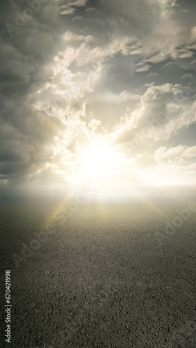 Concrete floor with dramatic cloudscape and sunlight