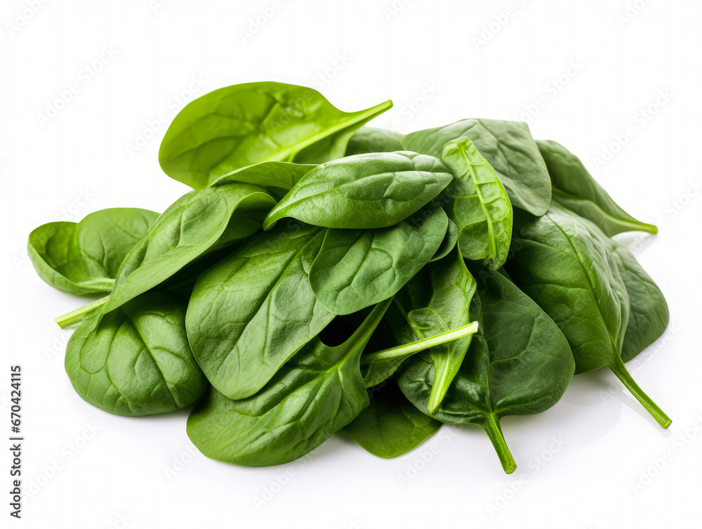 Pile of spinach leaves close-up on a white background