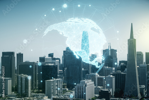 Double exposure of graphic America map hologram on San Francisco office buildings background, big data and digital technology concept
