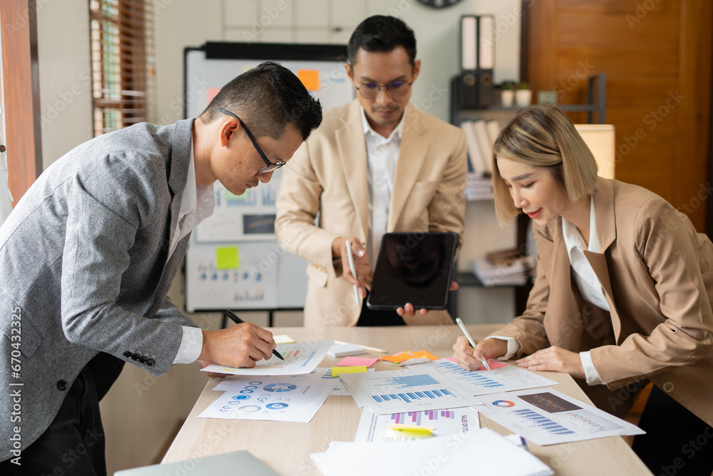 Asian businessmen talk about new projects have fun. Asian businessmen talk about new projects have fun.