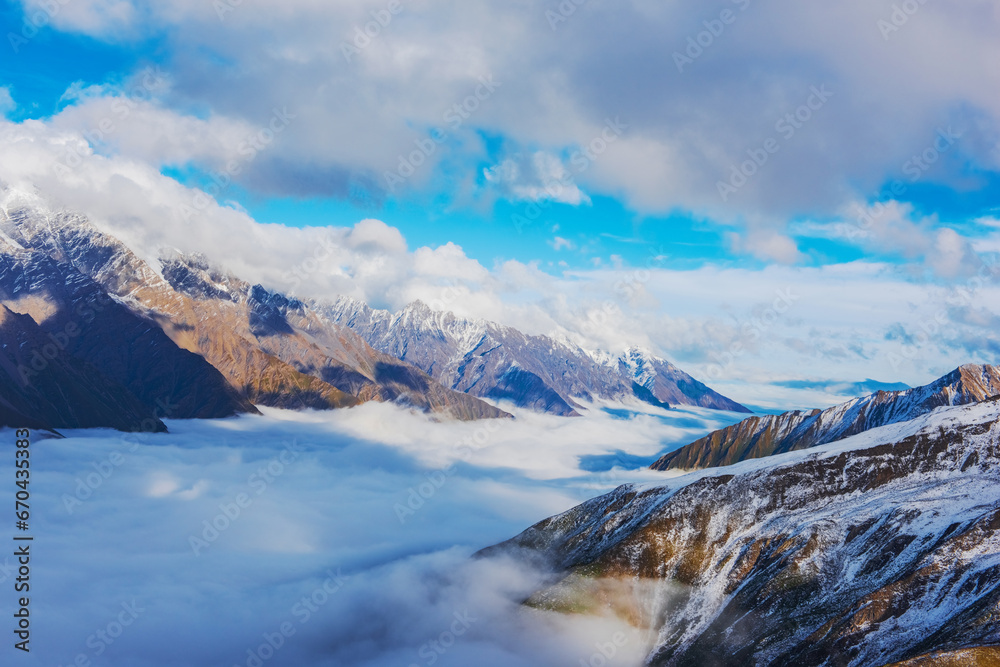 Beautiful Scenery of Snow Mountains and Sea of Clouds on Tibet Plateau, China 