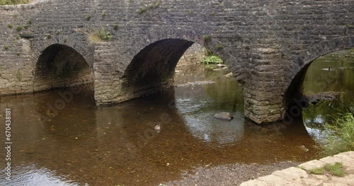 mid shot of stone bridge at Wetton mill looking east photo