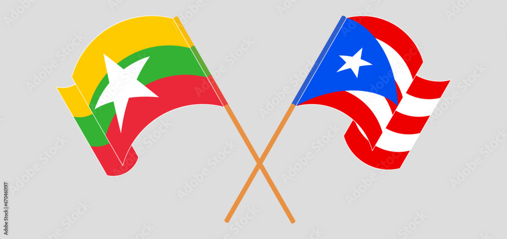 Crossed and waving flags of Myanmar and Puerto Rico