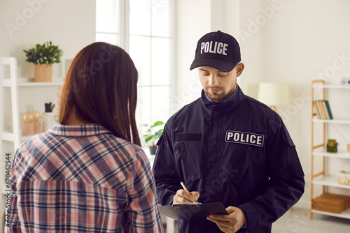 Photography Professional policeman interrogates witness, victim or suspect of crime