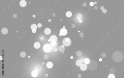 Dust sparks and stars shine with a special light. Christmas light effect. Glittering particles of magic dust.Vector sparkles on a transparent background.