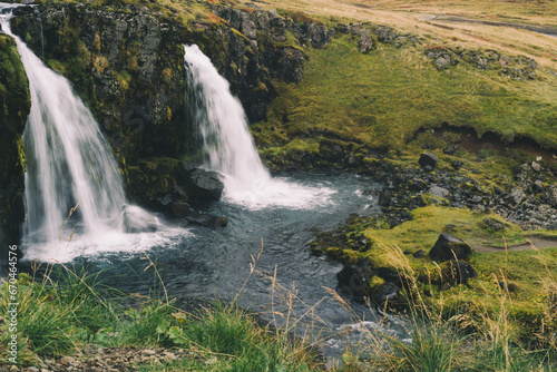 Beautifull arrowhead mountain Kirkjufell and waterfall on Snaefellsnes peninsula  Iceland