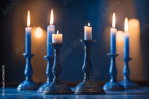 Close-up of a blue candlestick lit for a mysterious ceremony