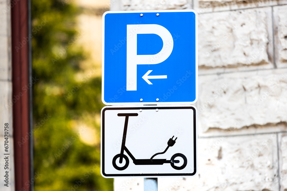 an electric scooter parking sign an electric scooter parking sign