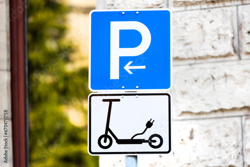 an electric scooter parking sign