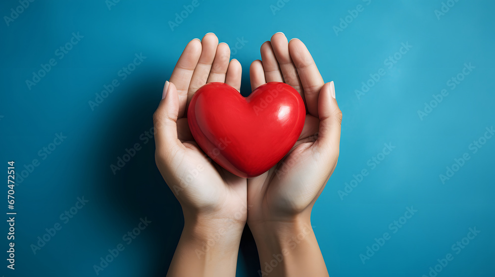hands holding red heart, health care, love