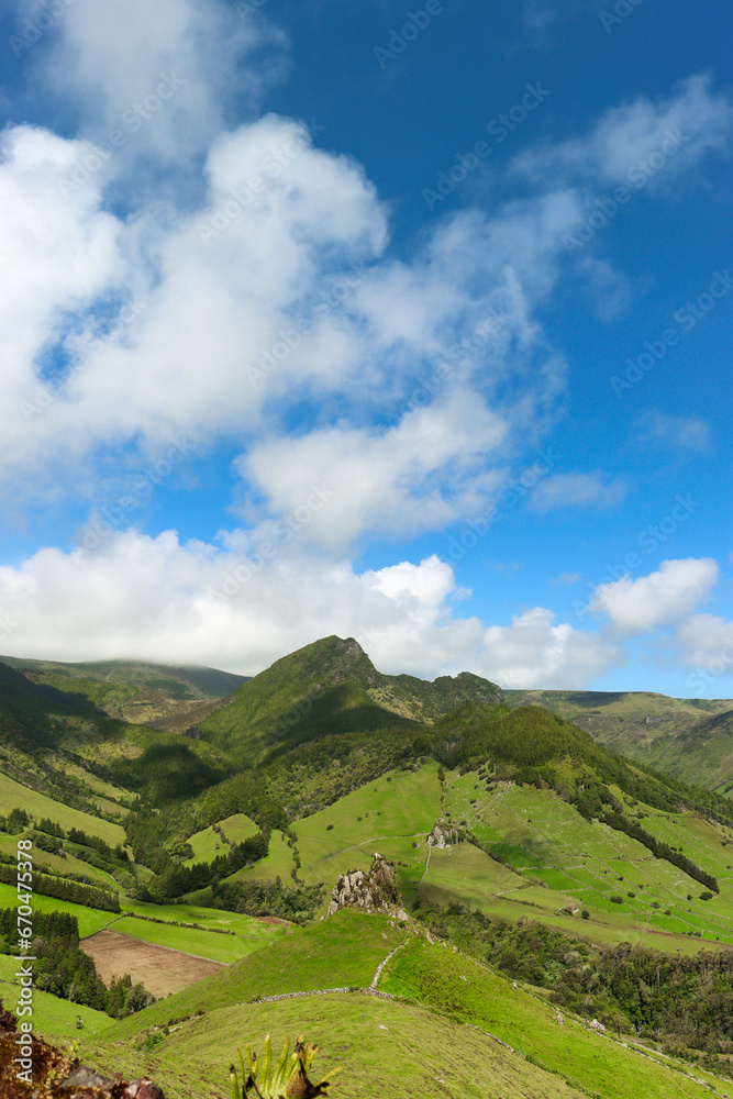 Fototapeta premium Island of Flores. Island of water. Portuguese Jurassic Park.Hills covered with vegetation.