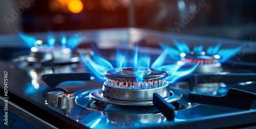 Gas flame on the stove, ban gas. A gas stove with a flame burning propane. The concept of industrial resources and economy. photo
