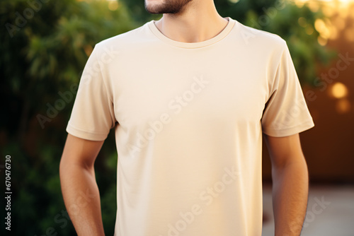 A Stylish Men's Beige T-shirt Mockup, Perfect for Cozy Comfort and Fashion Forward Chicness © Andrii Fanta