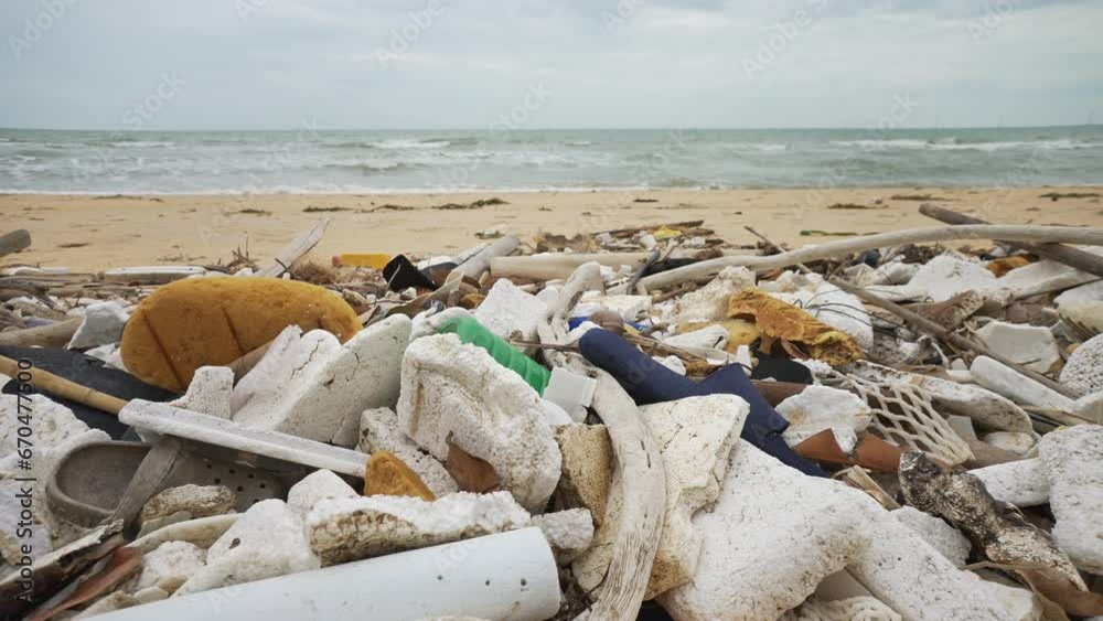 A Huge Amount of Plastic Debris is Thrown out by Ocean Waves on a Sandy Tropical Shore. Problems of Ecology and Pollution of the World's Oceans. Environmental Issues A Huge Amount of Plastic Debris is Thrown out by Ocean Waves on a Sandy Tropical Shore. Problems of Ecology and Pollution of the World's Oceans. Environmental Issues