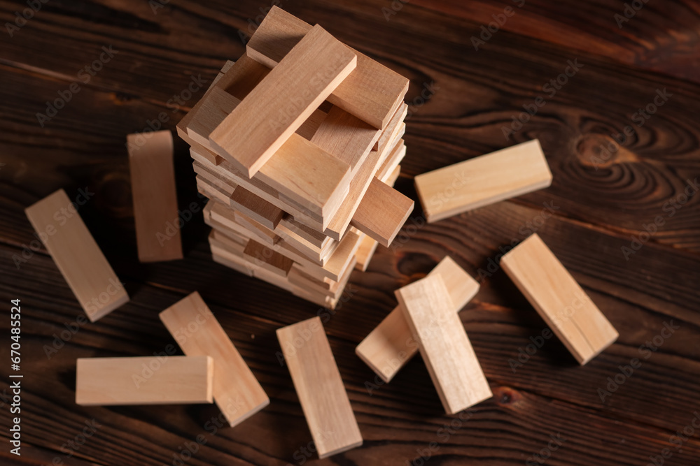 Wood blocks stack game top view, background. Concept of education, risk, development, and growth