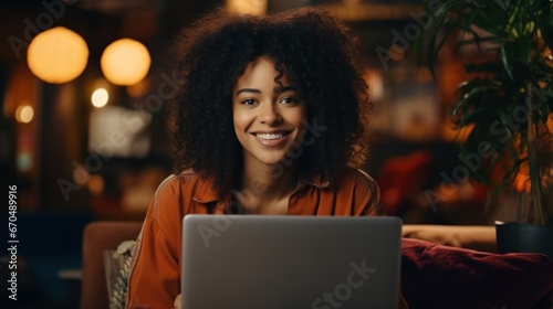 Portrait of smiling young african american woman using laptop in cafe Generative AI