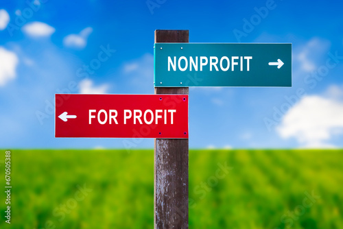 Nonprofit vs For Profit - Traffic sign with two options - subsidized unprofitable organization with no income vs entrepreneurship and business based on earning money. Charity vs capitalization. © Oleksandr