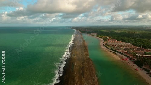 Wallpaper Mural Aerial Backward Shot Of Waves Splashing On Rocks In Sea Near Beach Against Sky - Ipojuca, Brazil Torontodigital.ca