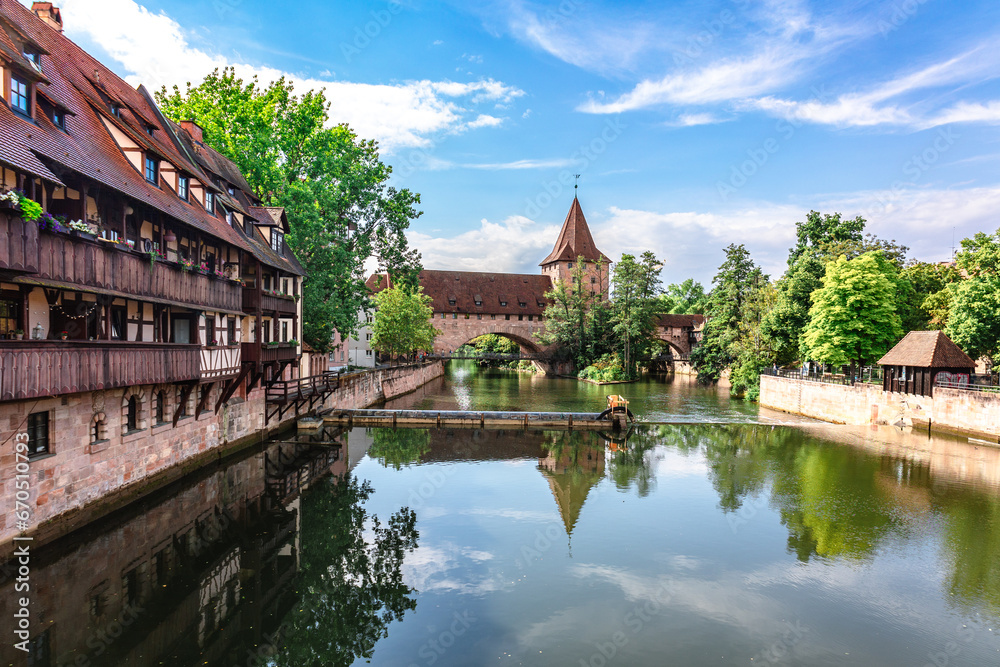 Colourful historic old town with half-timbered houses of Nuremberg. Bridges over Pegnitz river. Nurnberg, eastern Bavaria, Germany. High quality photo Colourful historic old town with half-timbered houses of Nuremberg. Bridges over Pegnitz river. Nurnberg, eastern Bavaria, Germany. High quality photo
