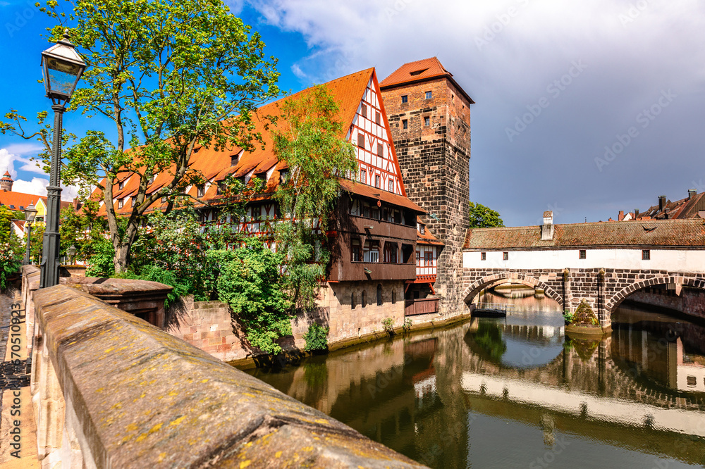 Colourful historic old town with half-timbered houses of Nuremberg. Bridges over Pegnitz river. Nurnberg, eastern Bavaria, Germany. High quality photo