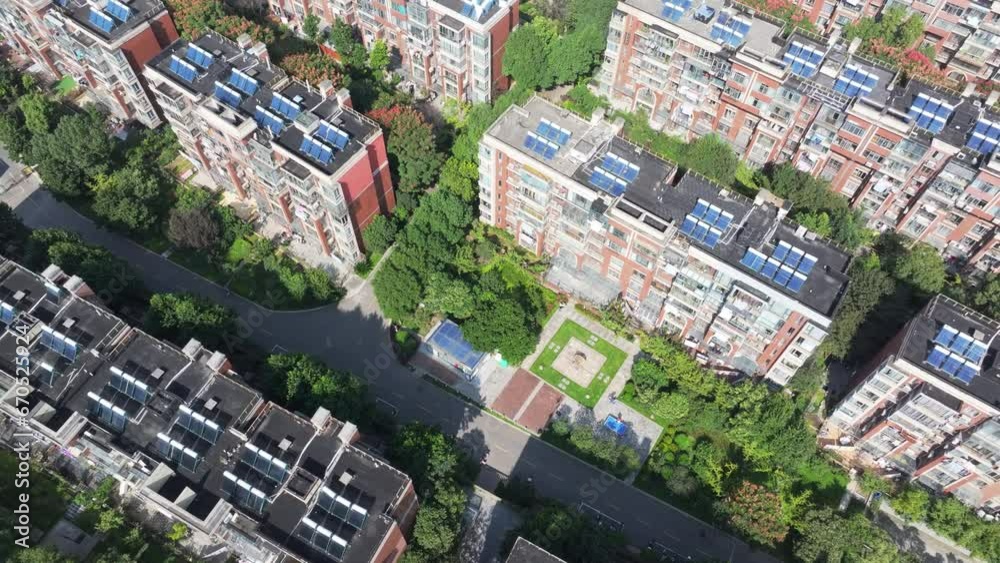 Aerial photography of green city, ecological city, livable environment, solar installations on roofs of urban residential areas Aerial photography of green city, ecological city, livable environment, solar installations on roofs of urban residential areas
