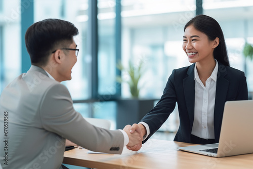 Woman accepting business deal, handshake with client and colleague
