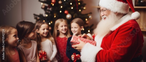 santa claus with christmas give presents to childrens