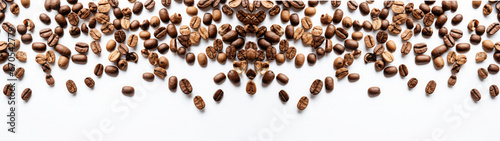 Brown coffee beans scattered isolated on white background banner, texture